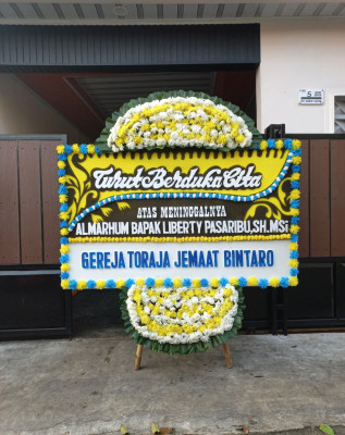 Papan Bunga Duka di Buer